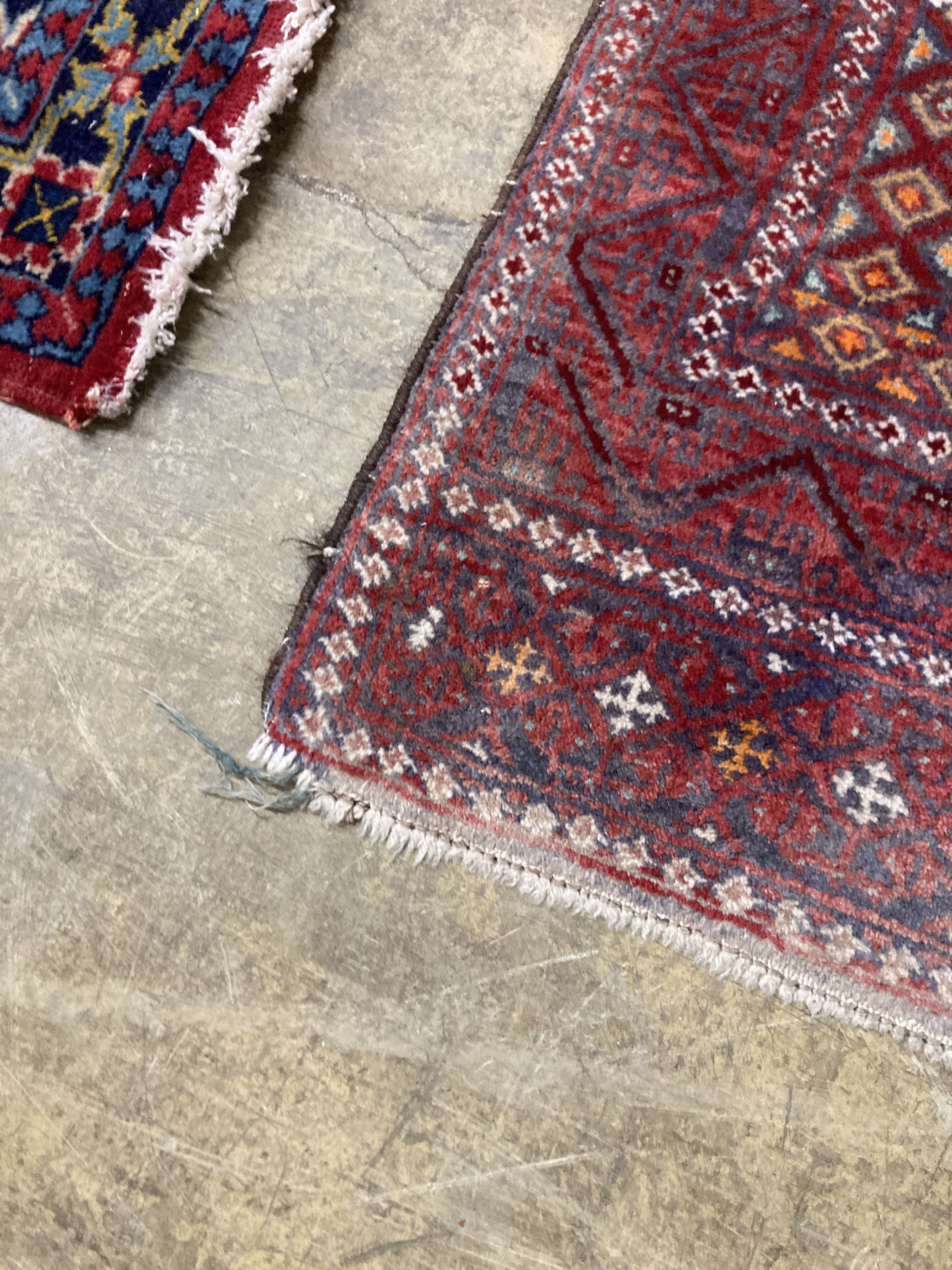 A Caucasian design red ground rug, 206 x 134cm together with a smaller West Persian design rug